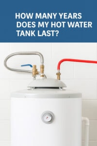 Hot water tank with red and silver supply lines, illustrating how long water heaters last and when replacement may be needed.